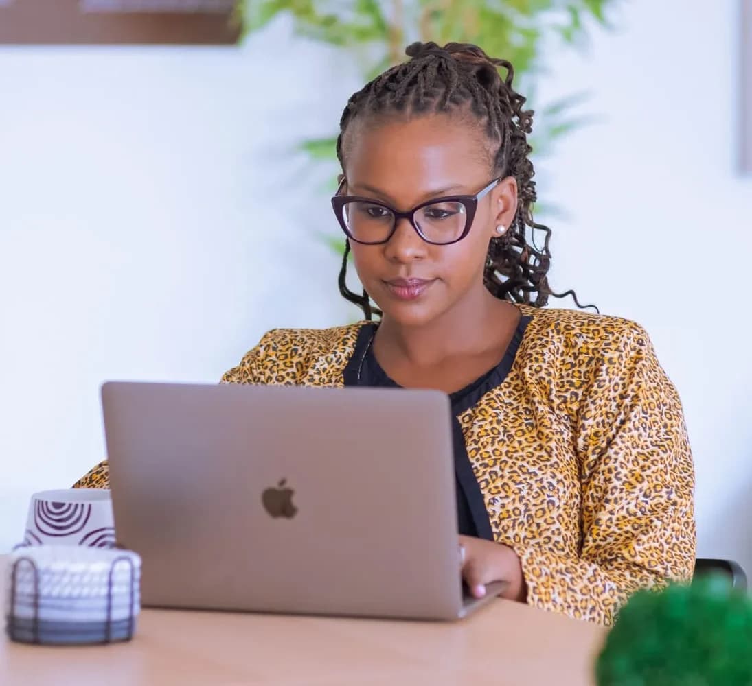 Joan Mwende working as a personal branding coach